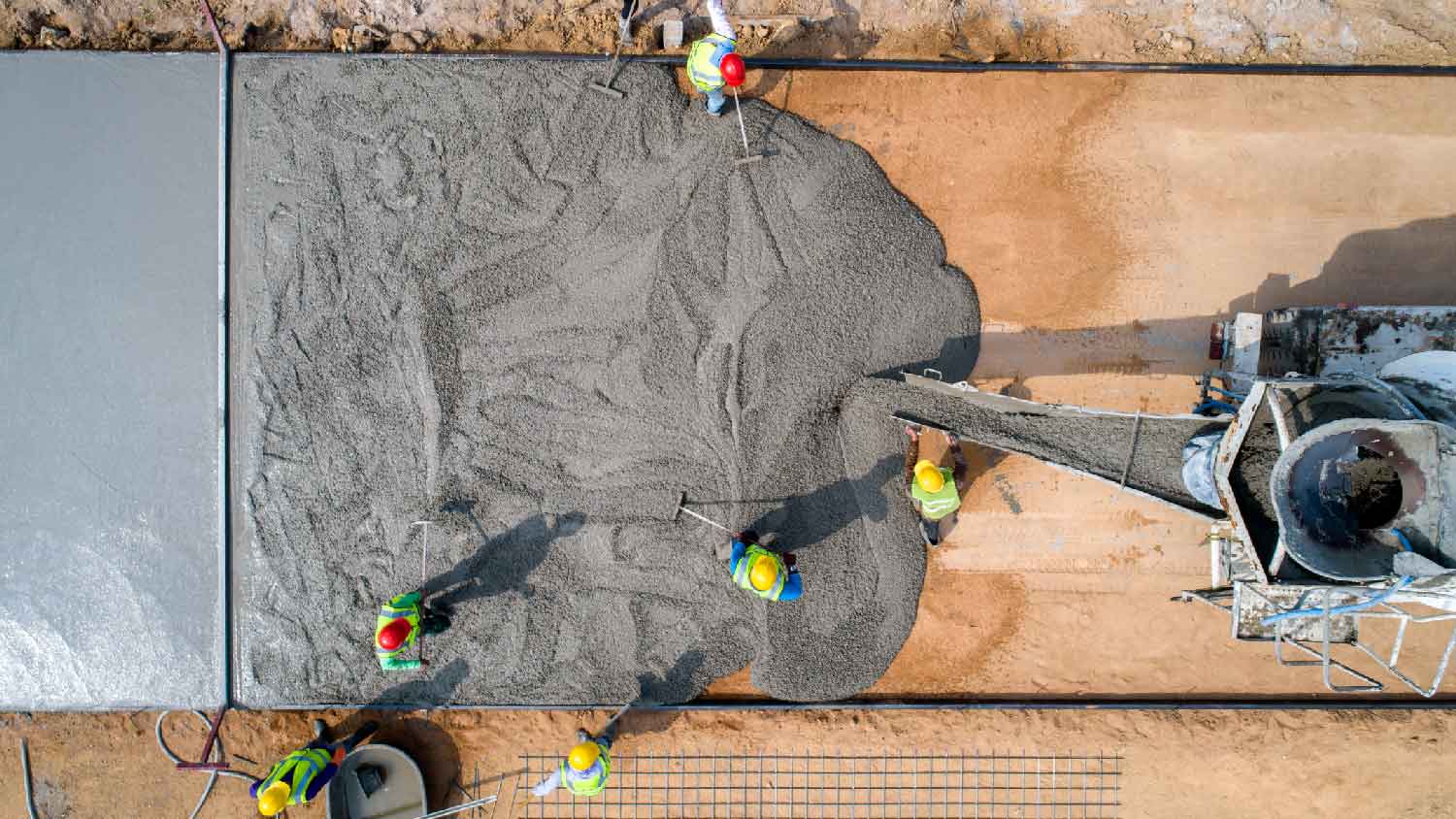 Overview of pouring concrete on a construction site