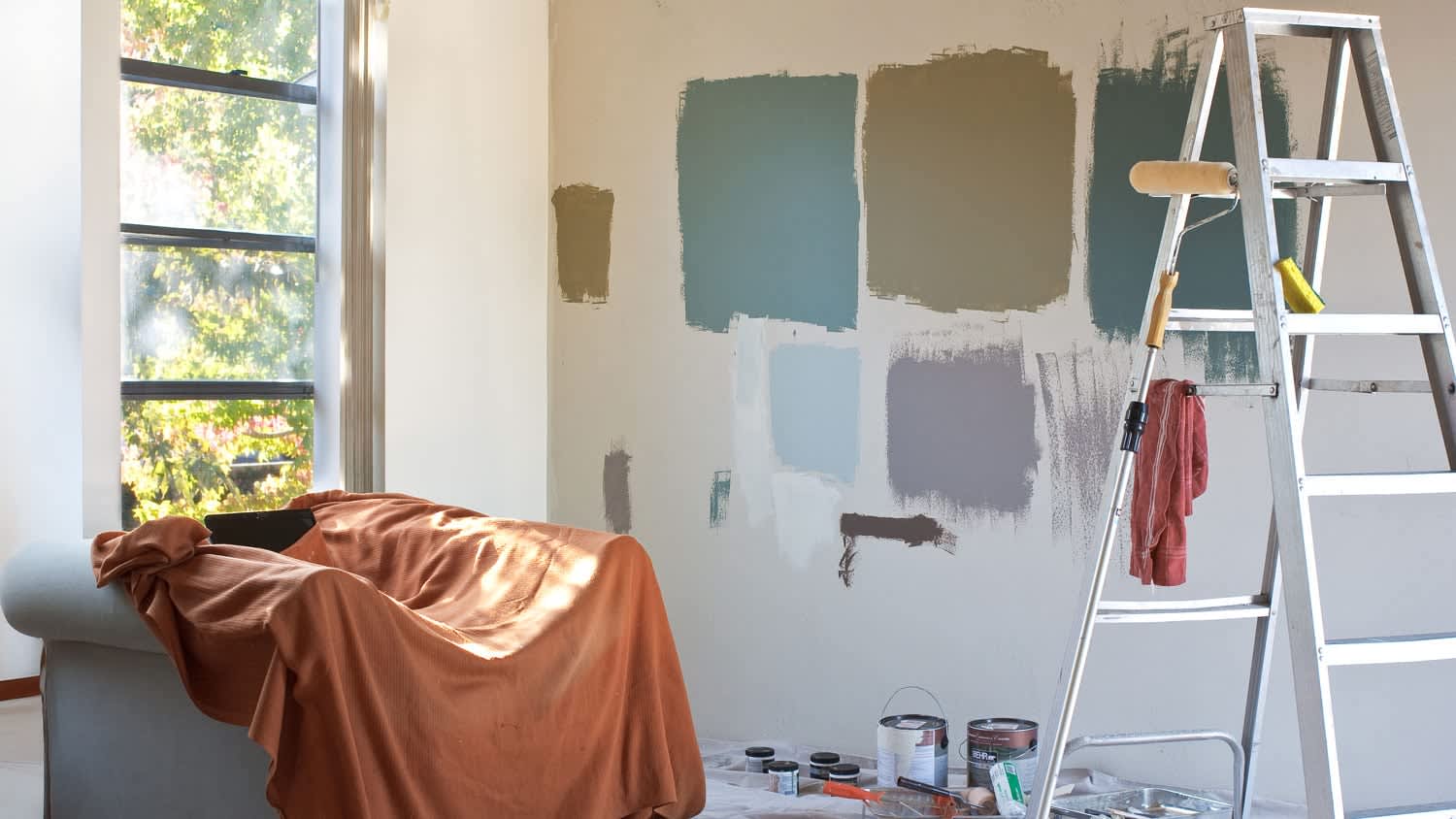 Paint samples on the living wall of an apartment