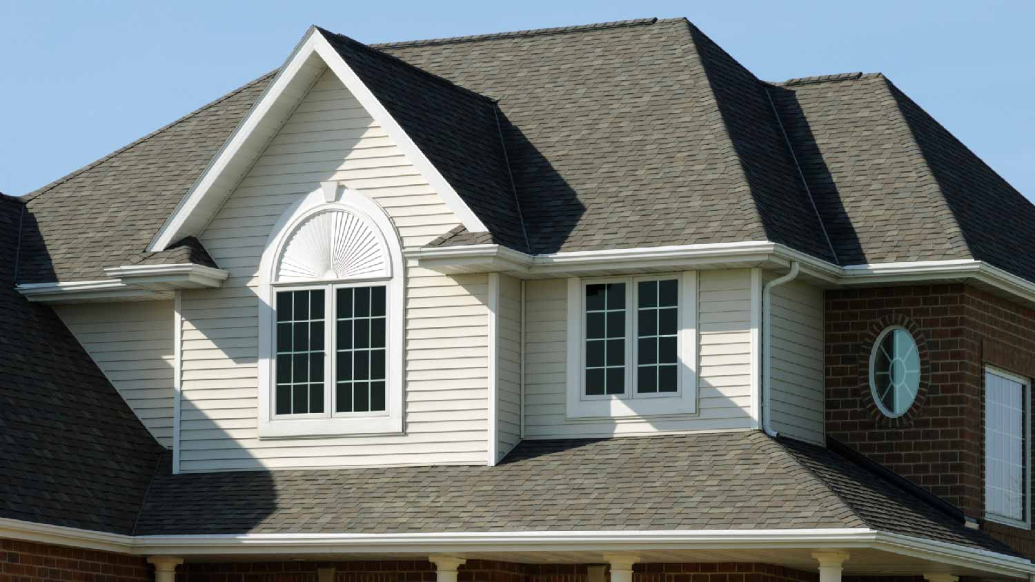 A two-story house with siding