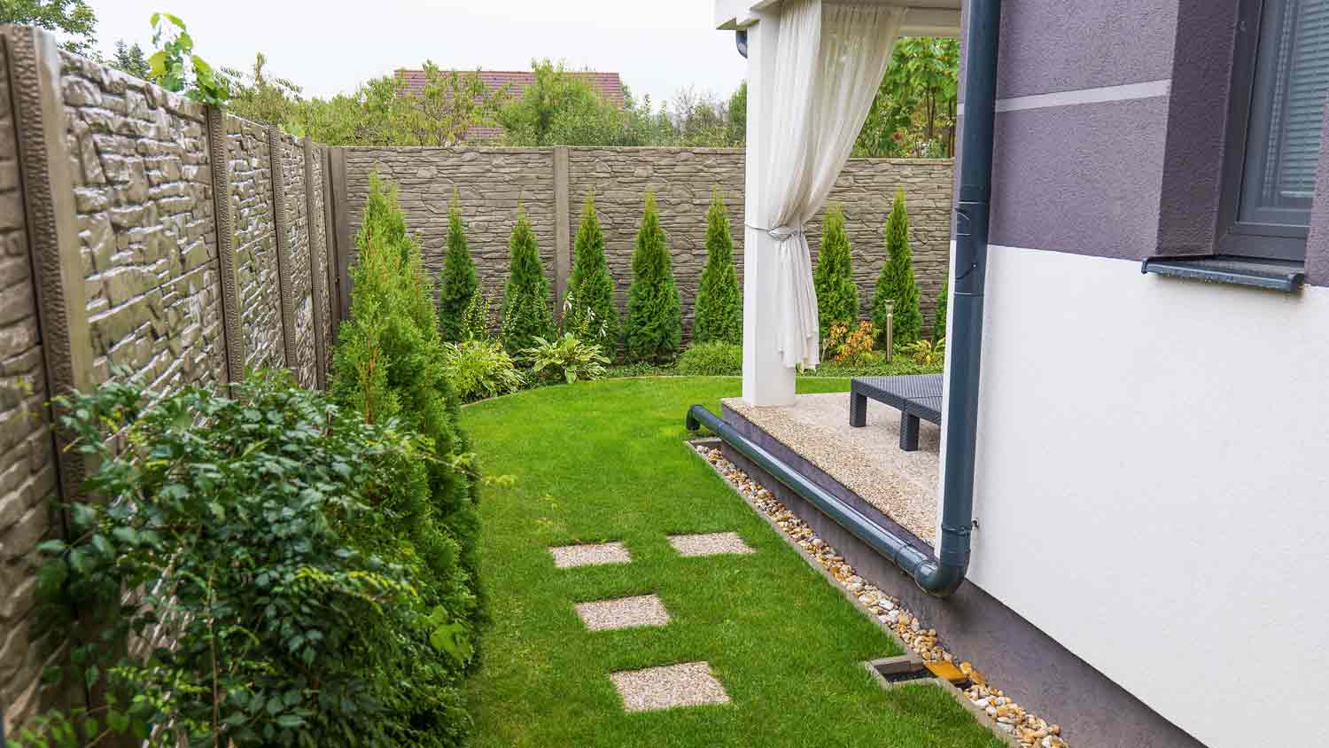 gutter downspout placement into garden