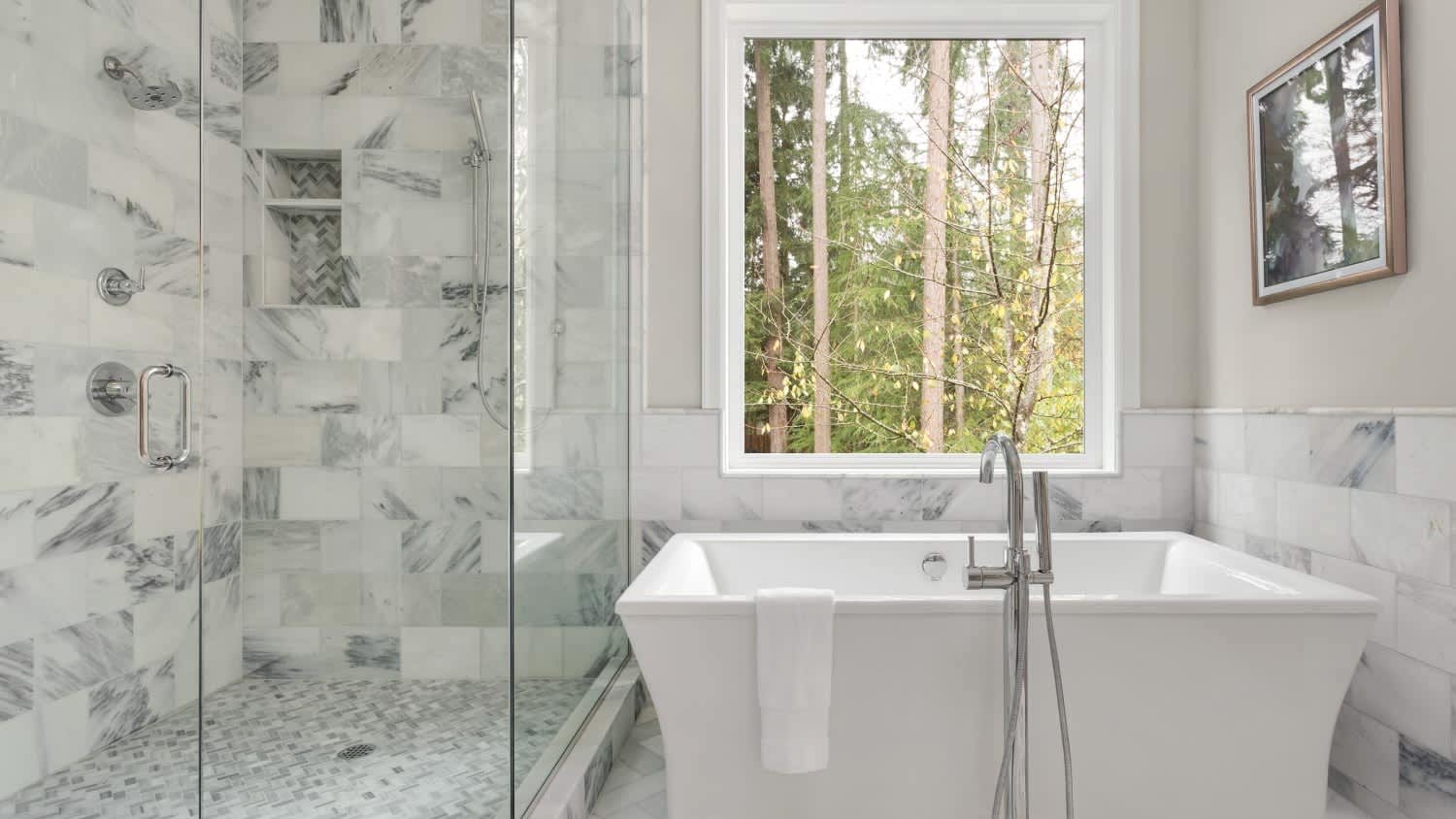 Bathroom with bathtub and shower