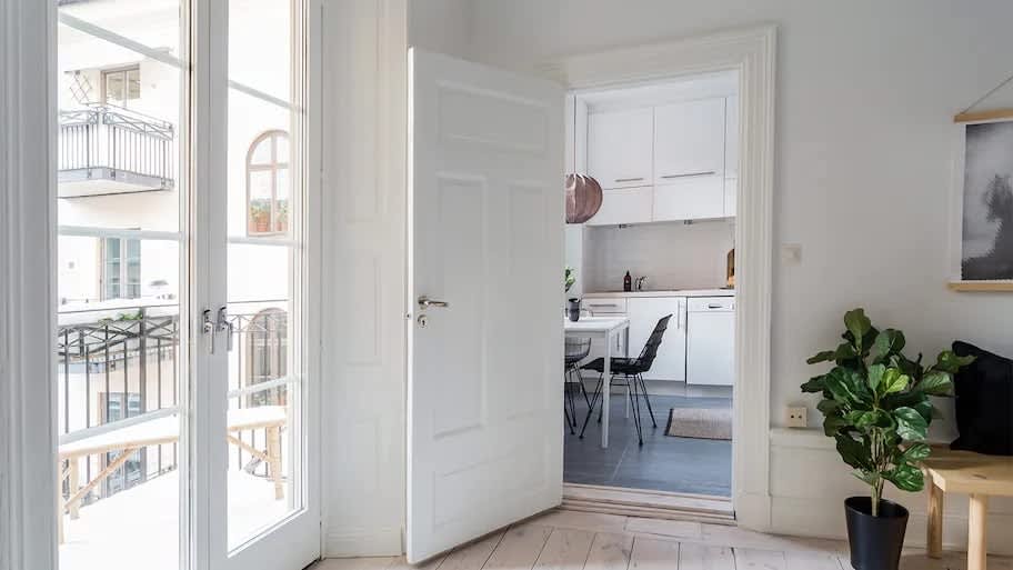 kitchen area with white wood door