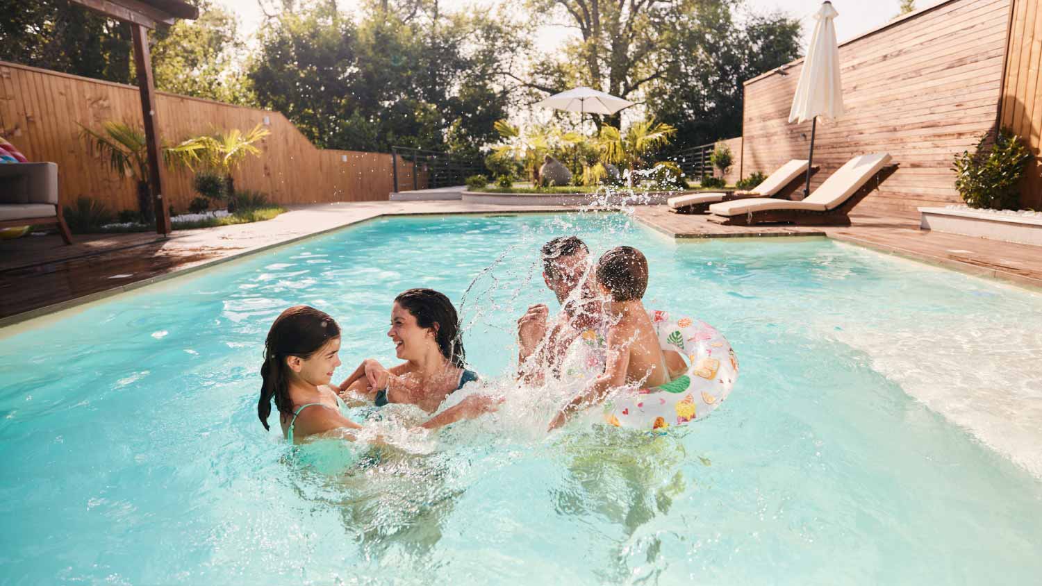 Family having in the pool