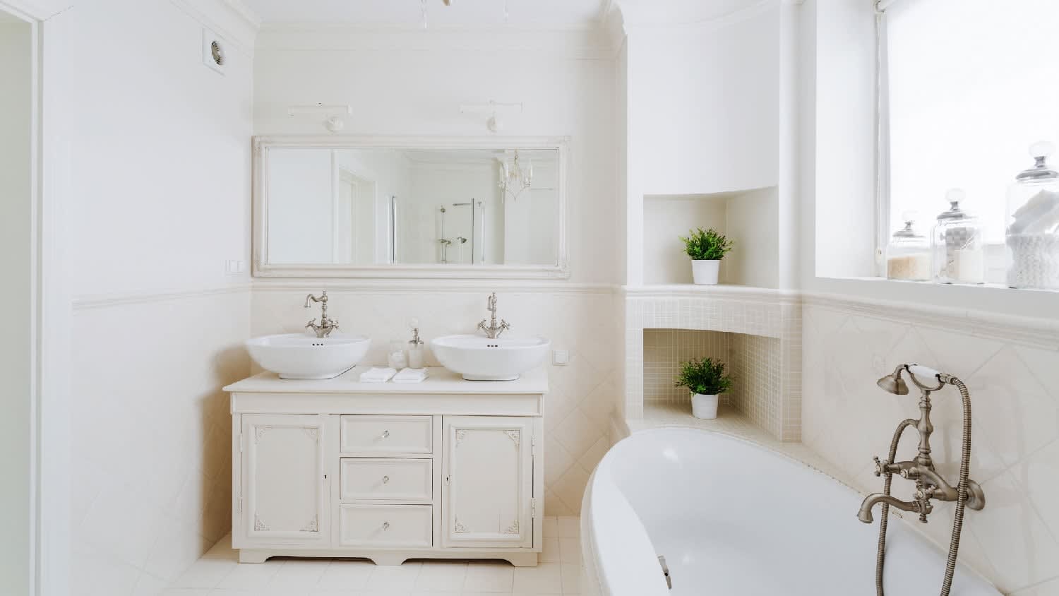 A bright bathroom with drywalls