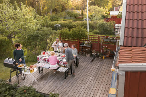 family having a meal on the deck