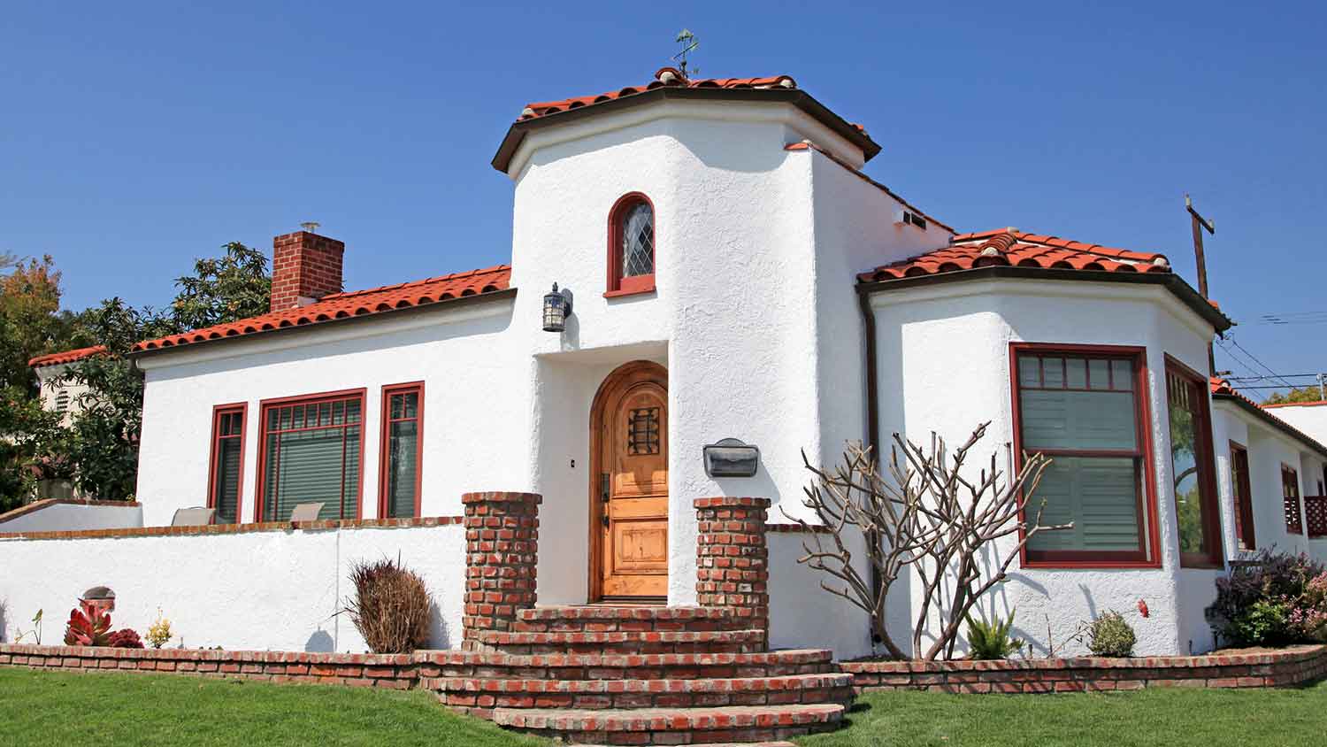 Spanish-style house with white stucco siding