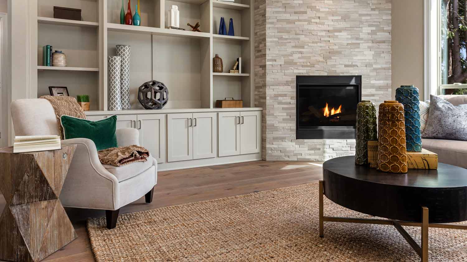 A living room with a fireplace