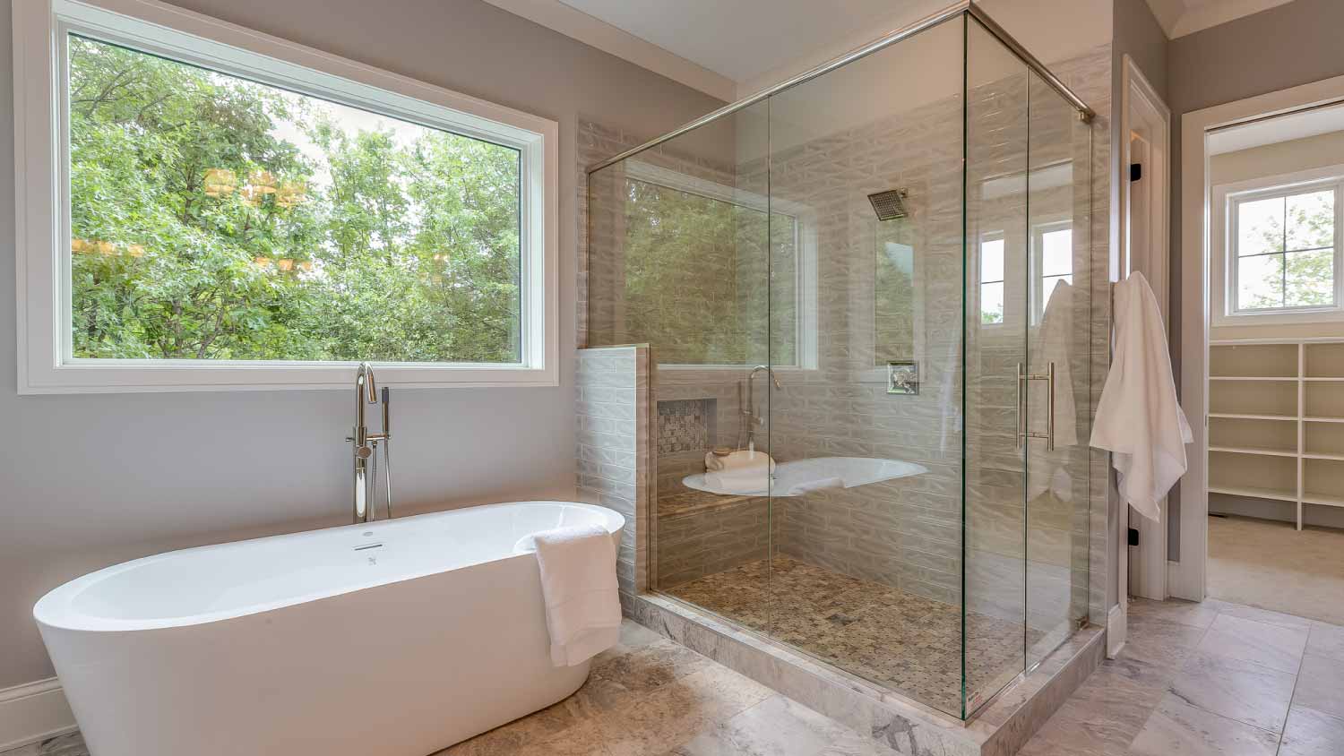Large glass shower and bathtub