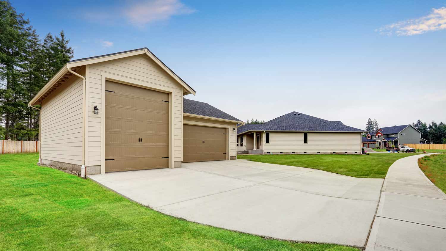 garage with concrete driveway