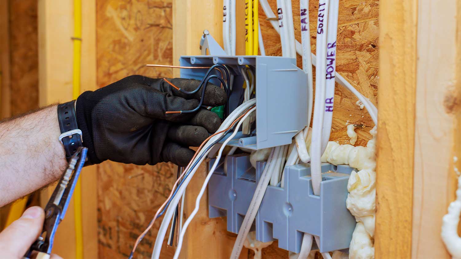 Man working on electric box