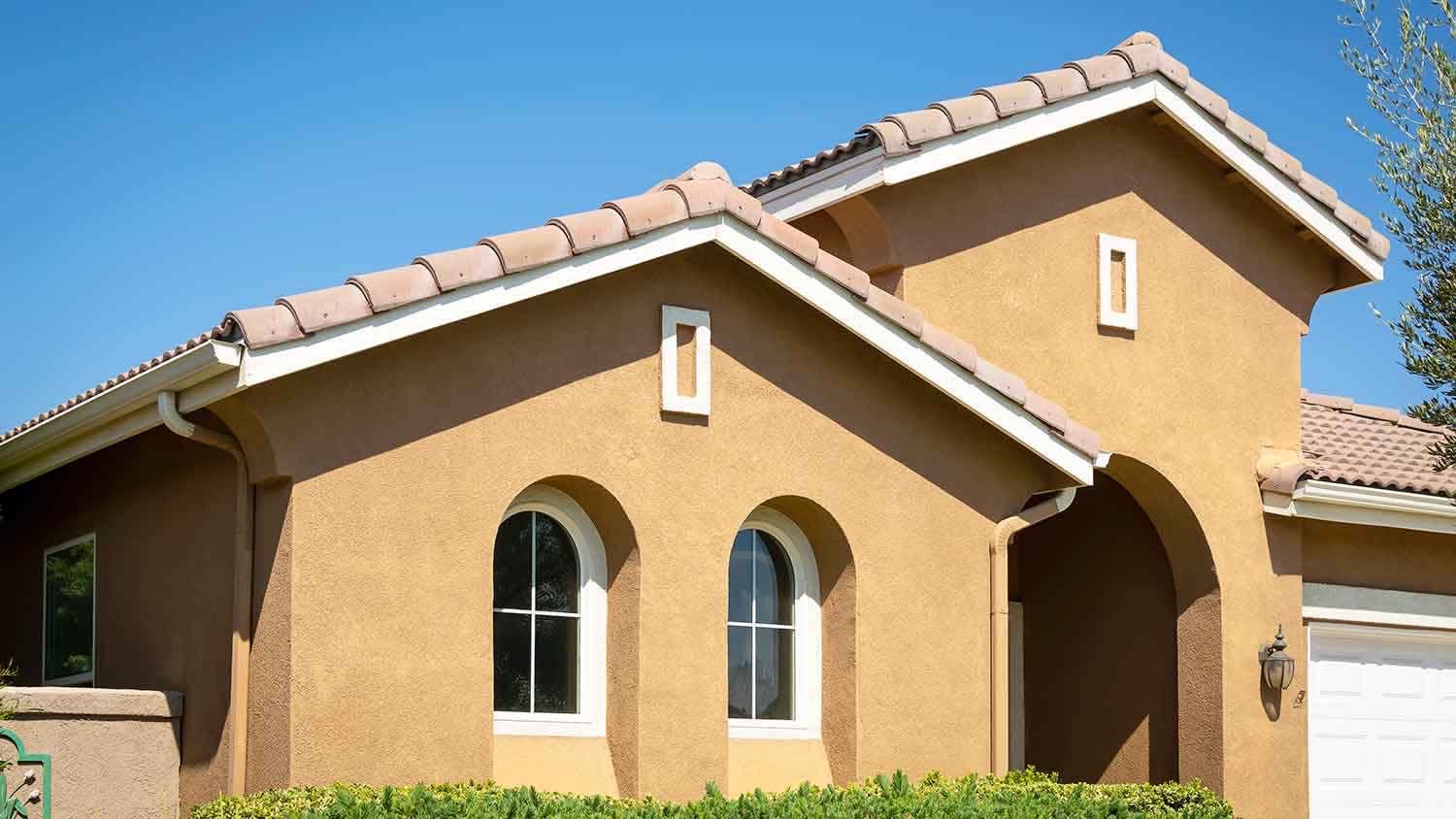 Stucco house exterior on a sunny day