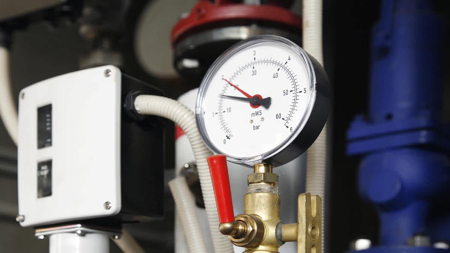 Close-up of water heater recirculation system