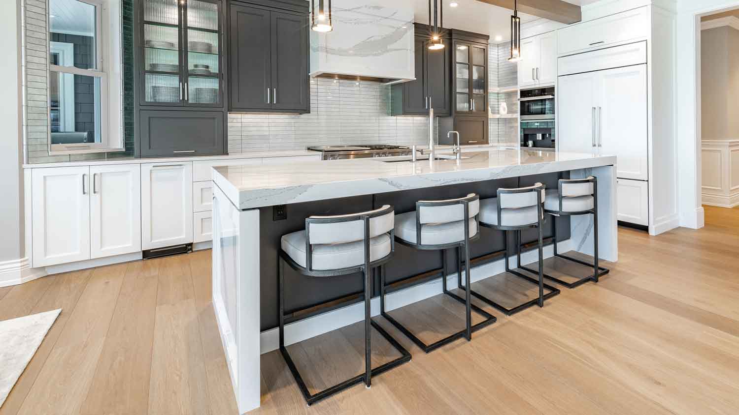 Luxury kitchen with breakfast bar and stools