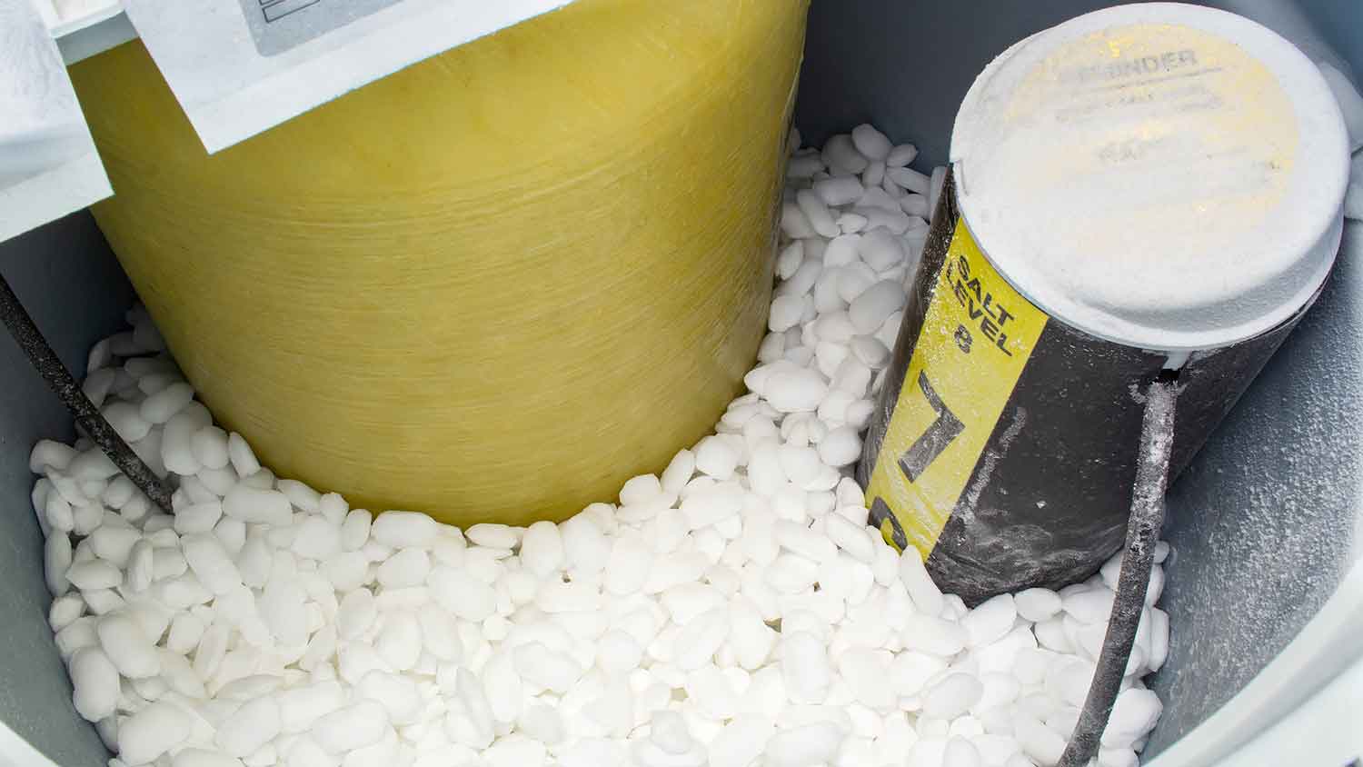 Salt pellets in a water softener tank