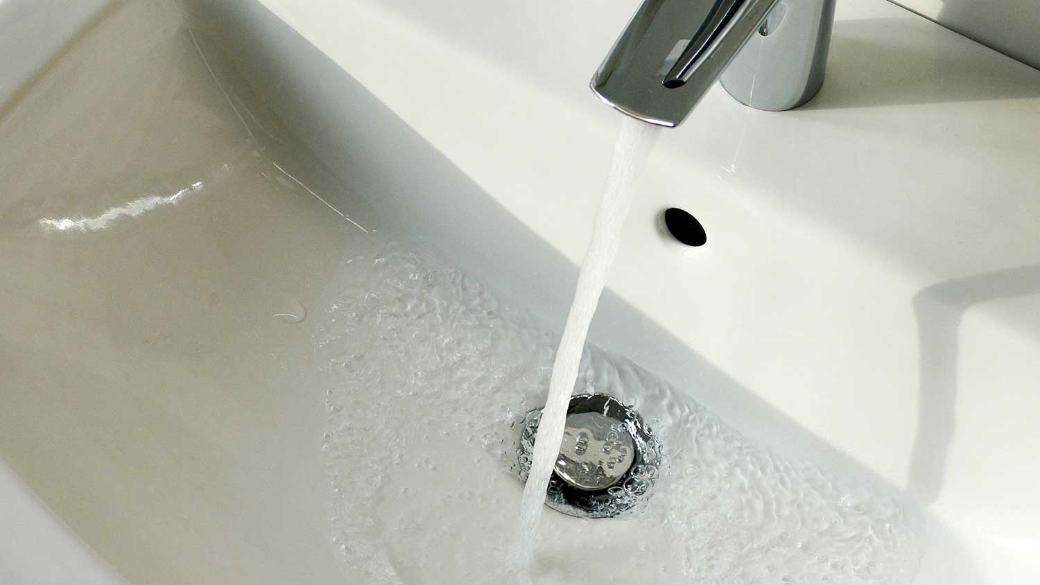 Water coming out of a bathroom faucet