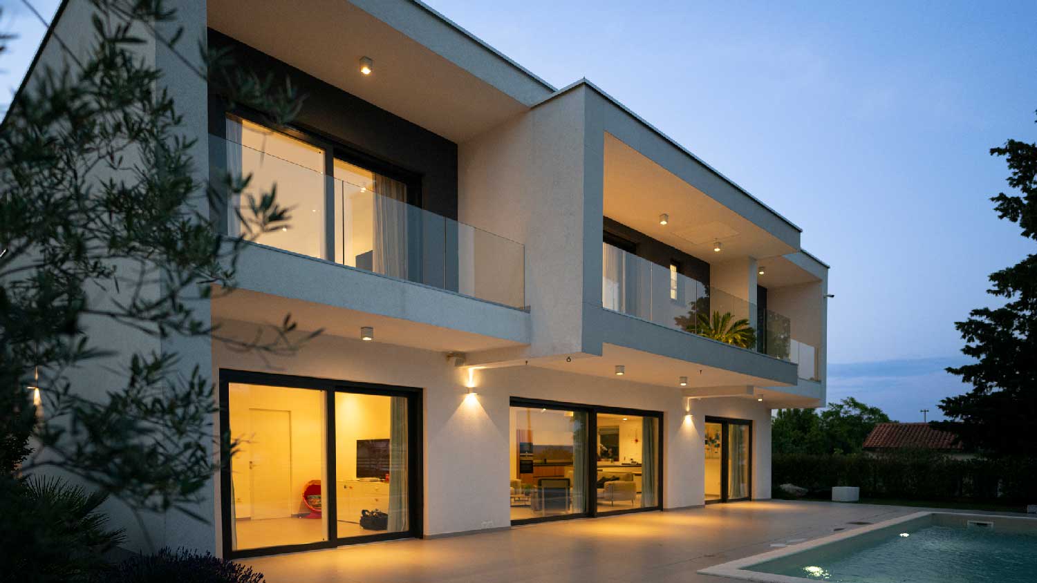 A contemporary house with smooth walls and pool