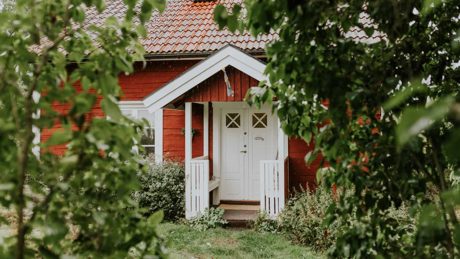 Red traditional summer cottage