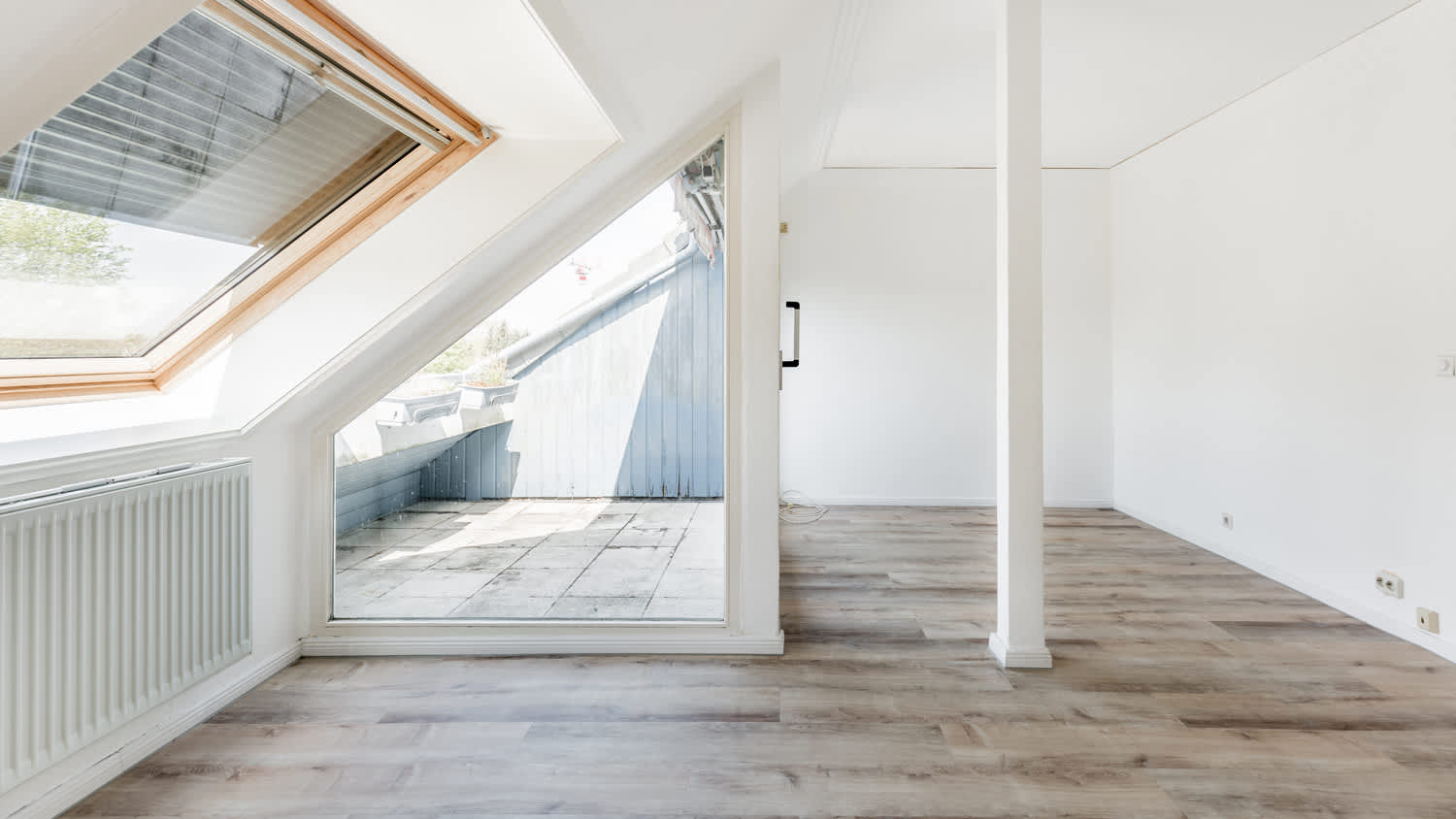 Empty apartment room in attic