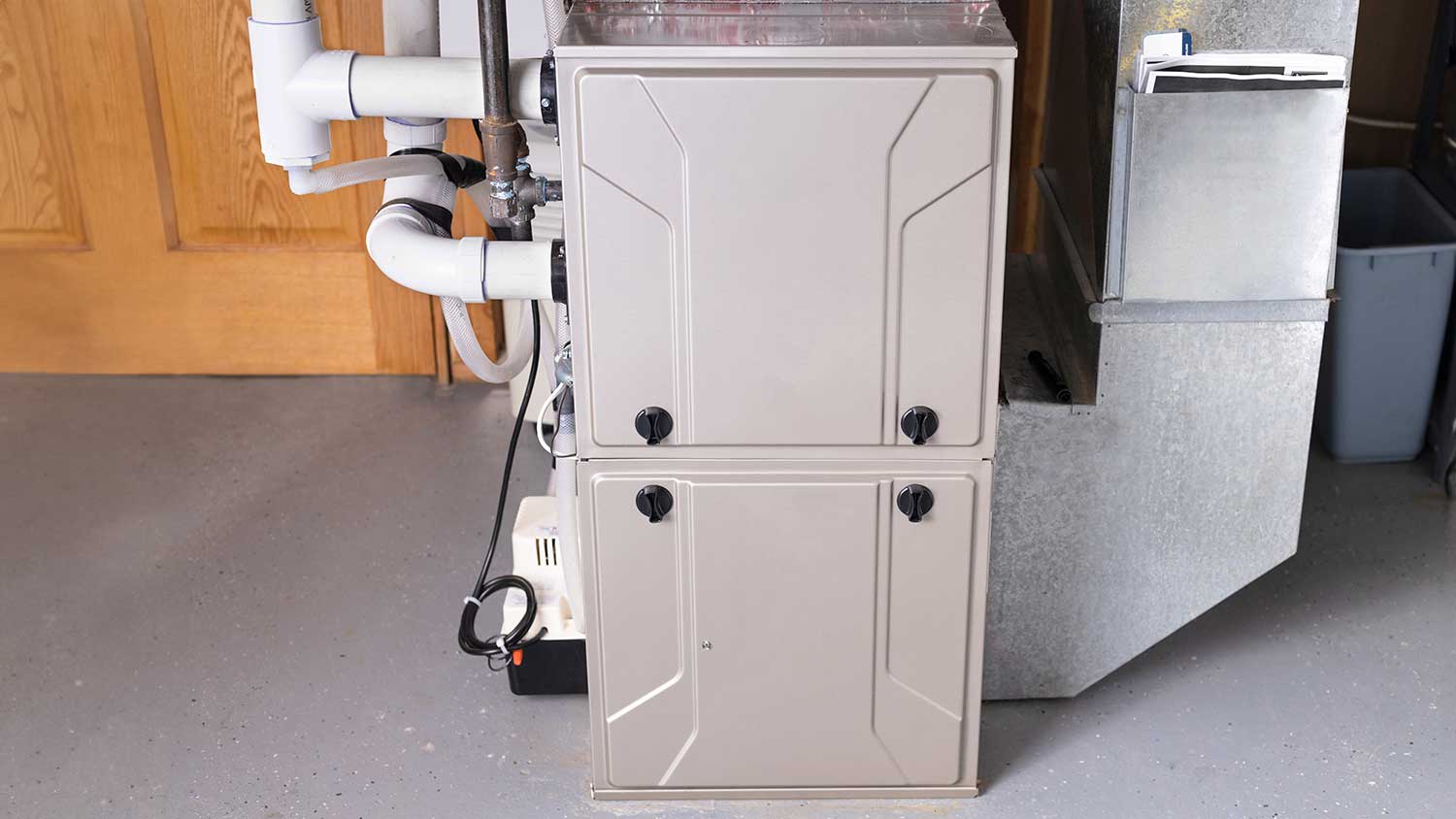 HVAC air handler unit installed in the basement