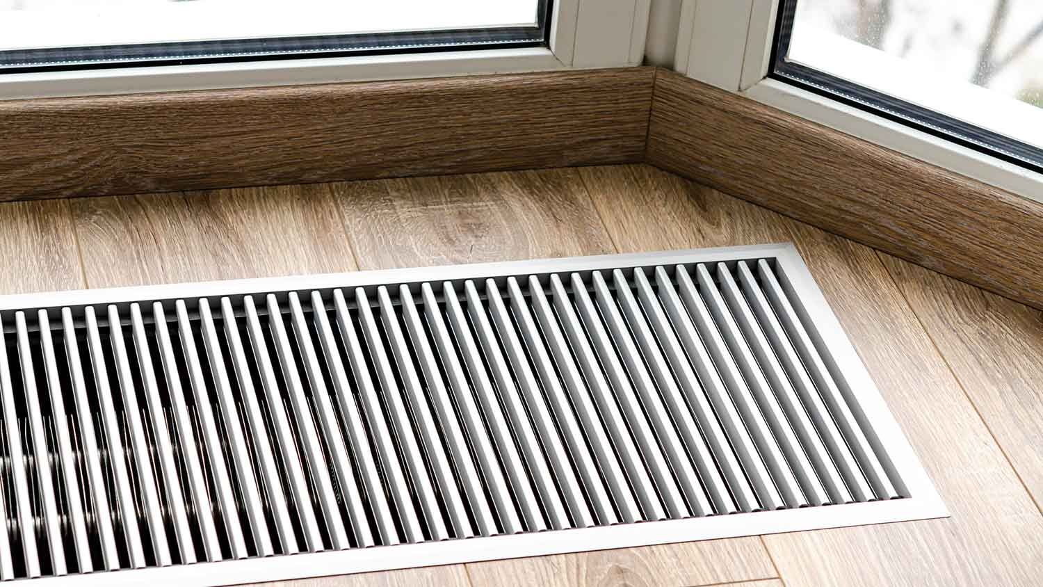 Air vent return installed on the floor of the room