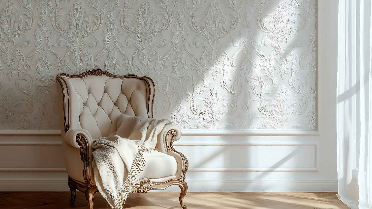 A vintage armchair in a room with flocked wallpaper