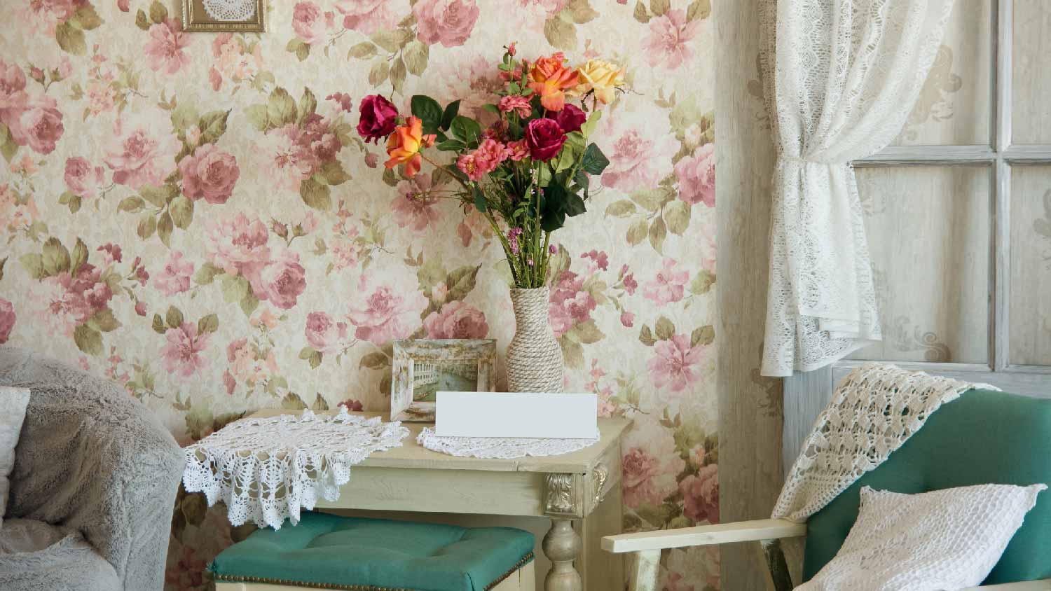 A retro room with floral wallpaper