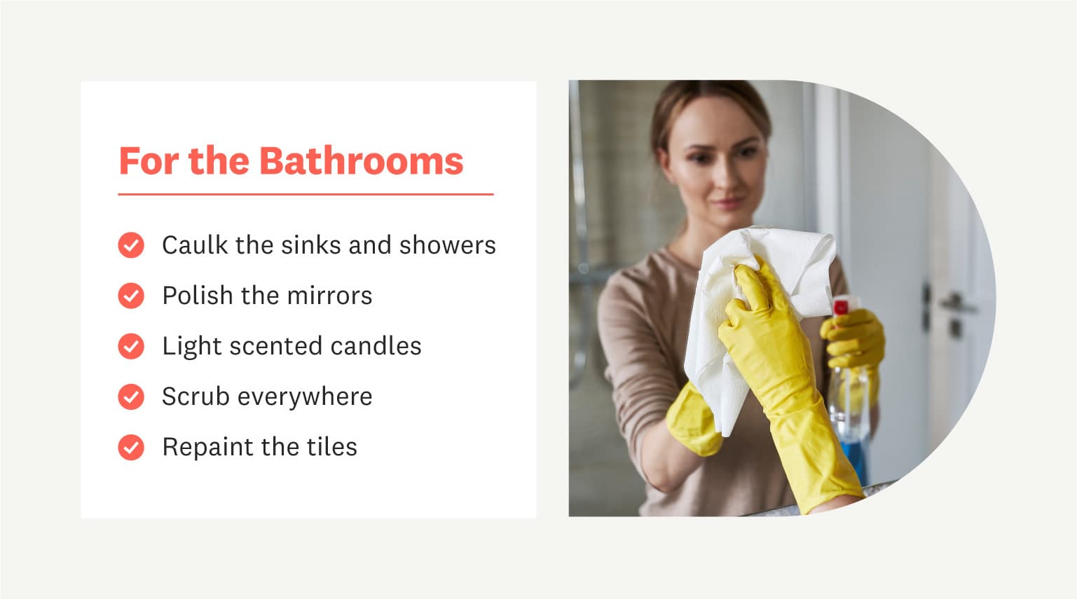 woman cleaning bathroom mirror