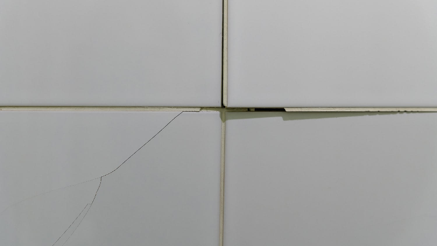 Bathroom tiles with a hairline crack