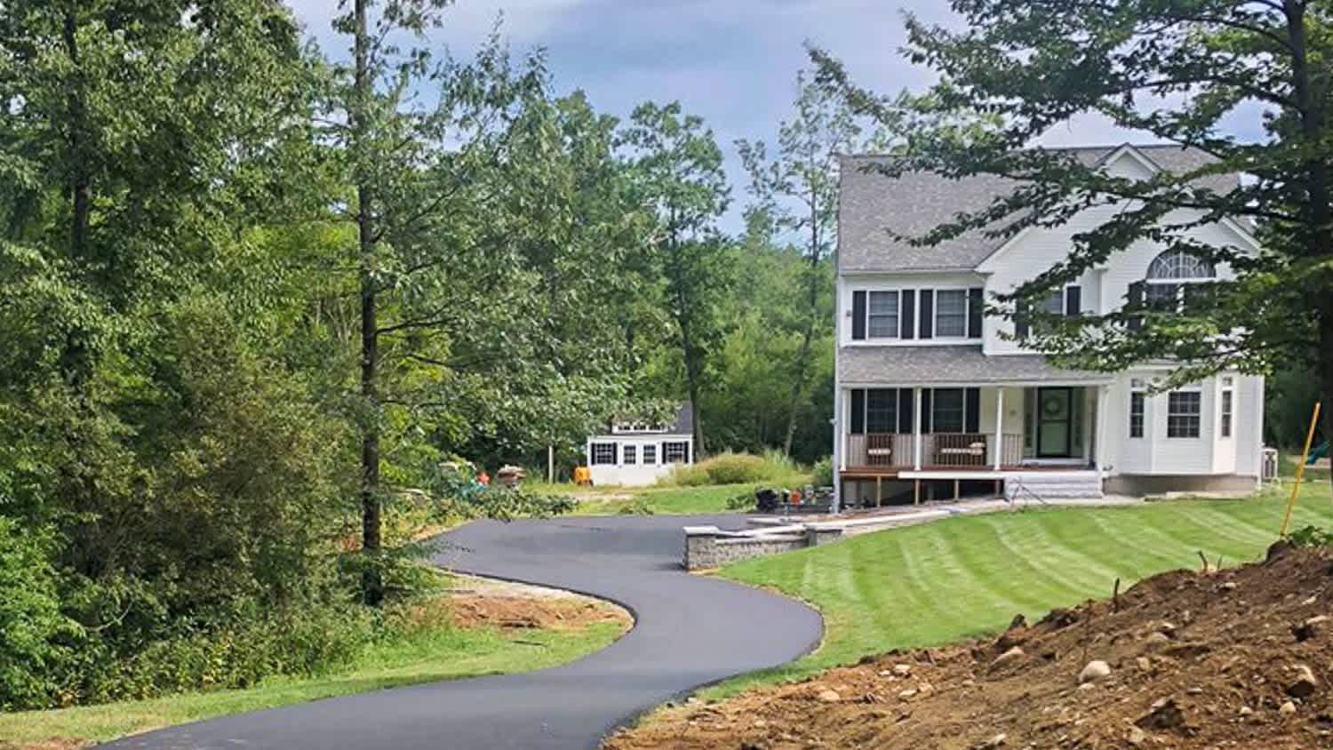 White house with S-shaped driveway