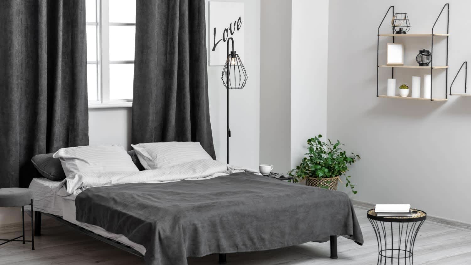 A bedroom with blackout curtains