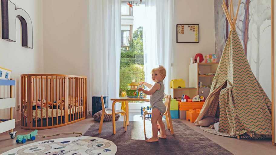 baby boy playing in nursery