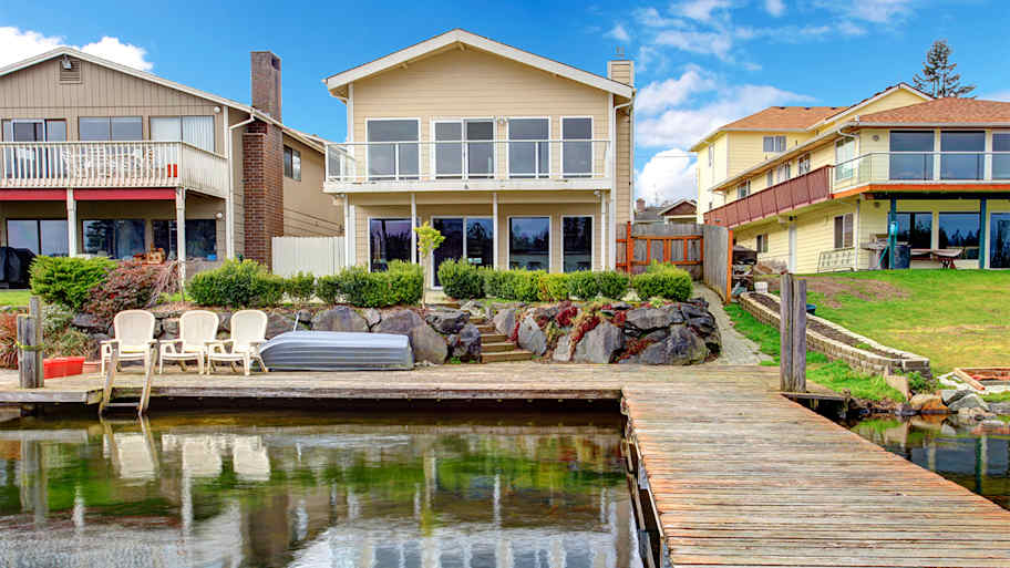 backyard view of home with dock