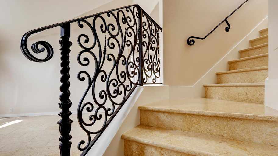 Detail of wrought iron railing on a staircase