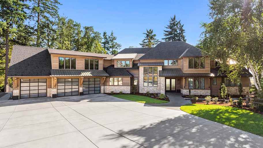 Three car garage house with large driveway