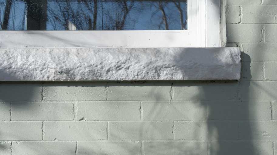 Painted brick house detail.