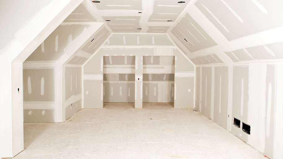 New drywall tape and mud at construction site