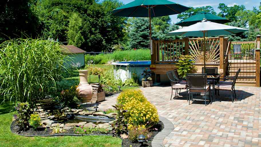 Terrace with table and sun umbrella