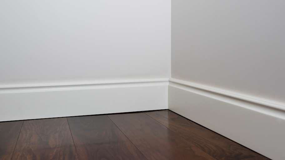 Wooden floors and white baseboards