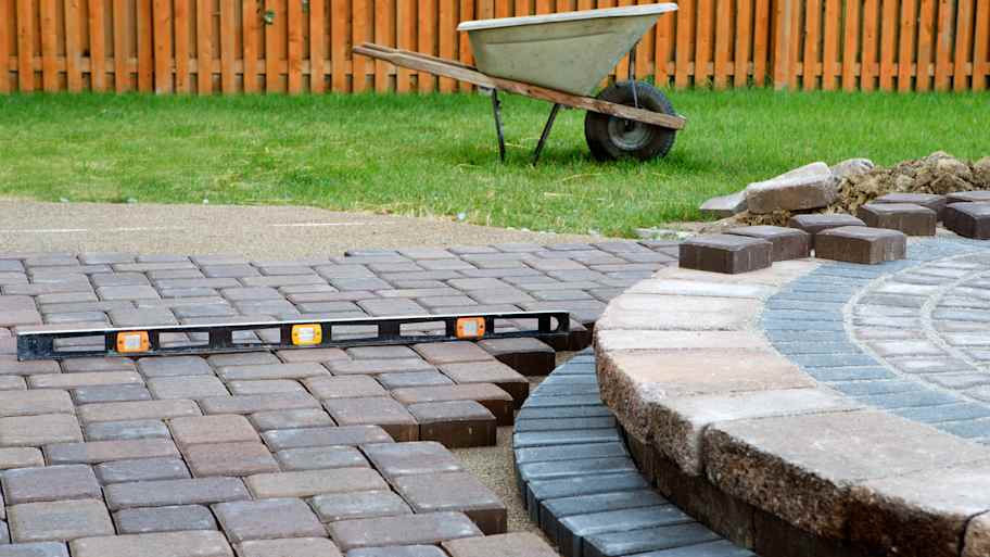 Patio under construction with interlocking pavers