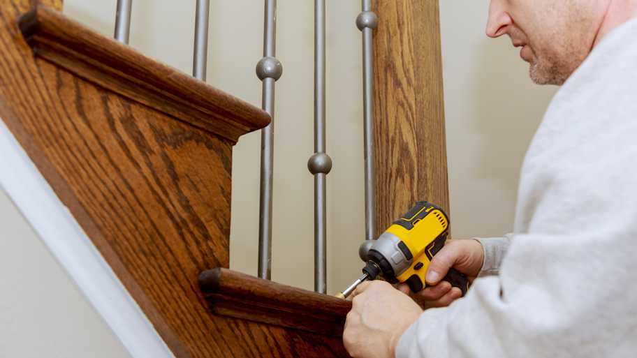 Worker installing new spindle 