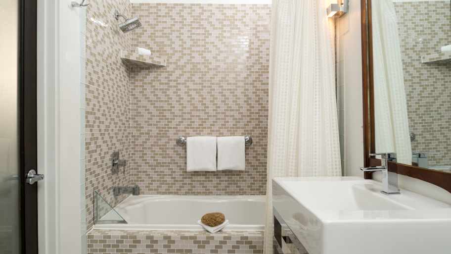Modern tiled bathroom with shower 