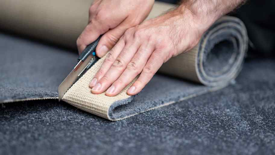 Close-up of carpet installation