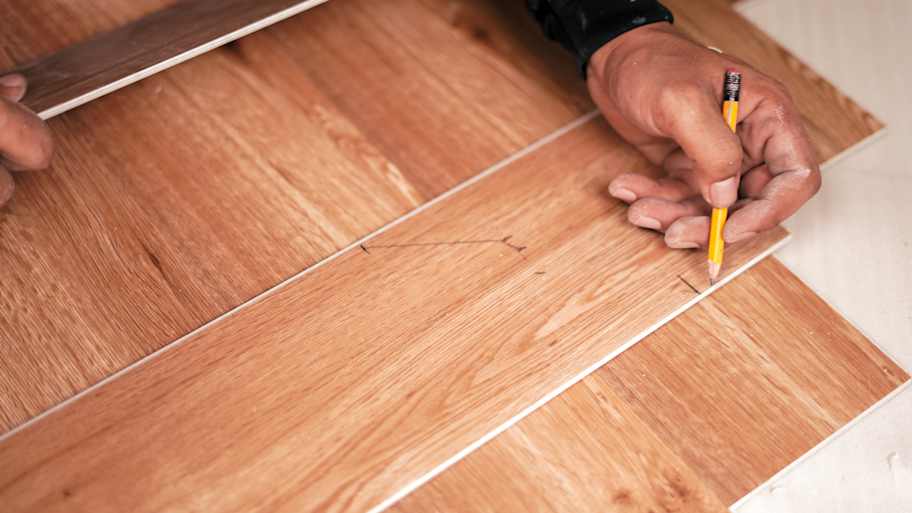 Man writing on pvc floor