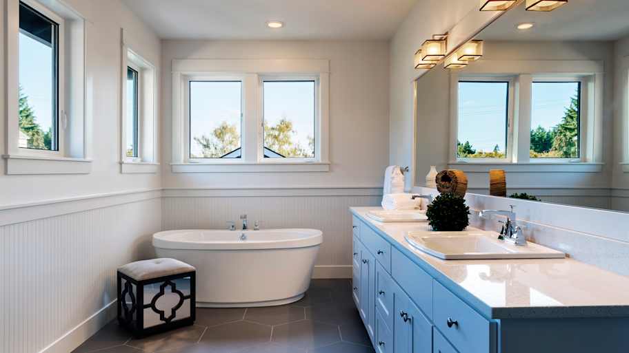 Bathtub and sinks in bathroom 