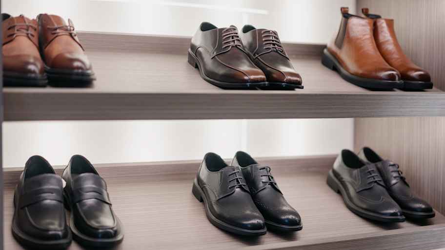  shoes on a wooden shelf 