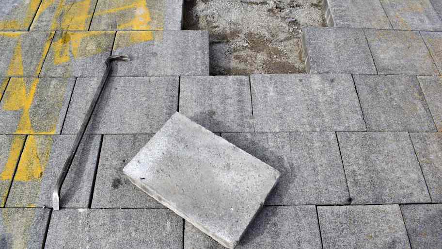 Pave a sidewalk with precast pavers