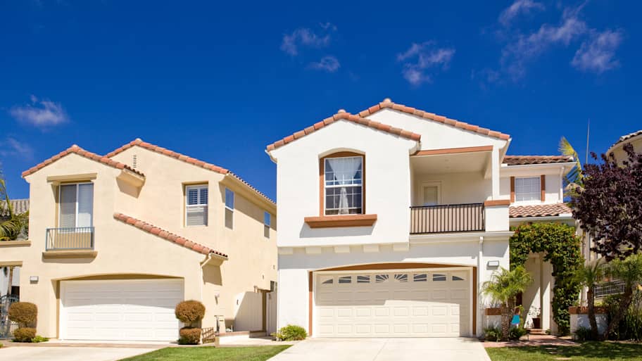 California houses with balconies and stucco siding