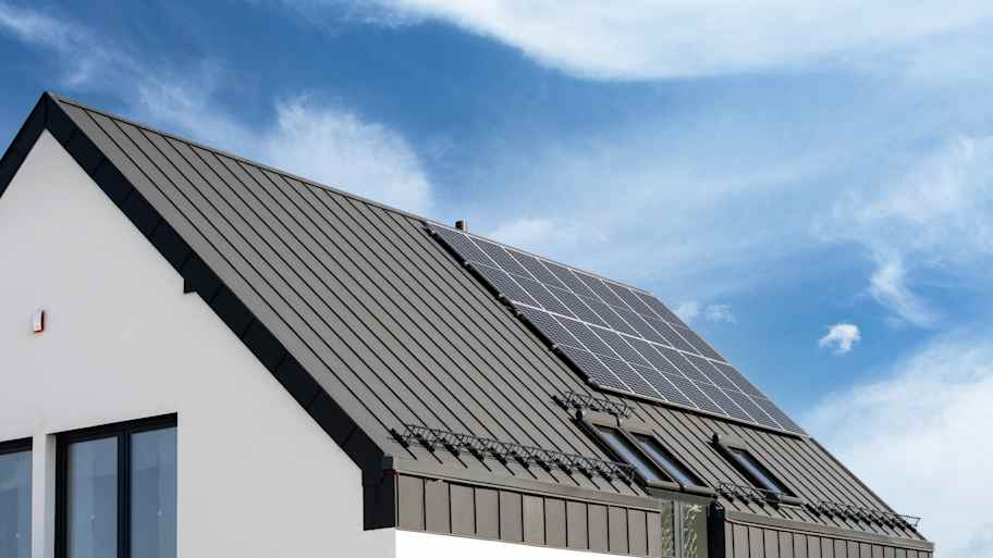 metal roof on white house