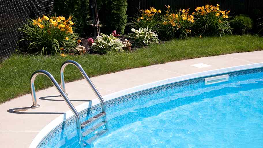 swimming pool in backyard