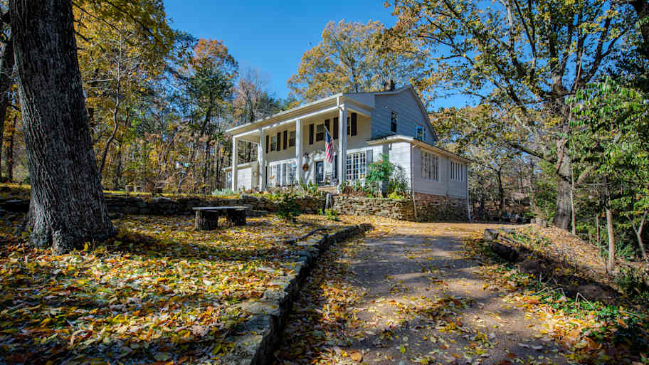 A house in the suburbs located on a hill